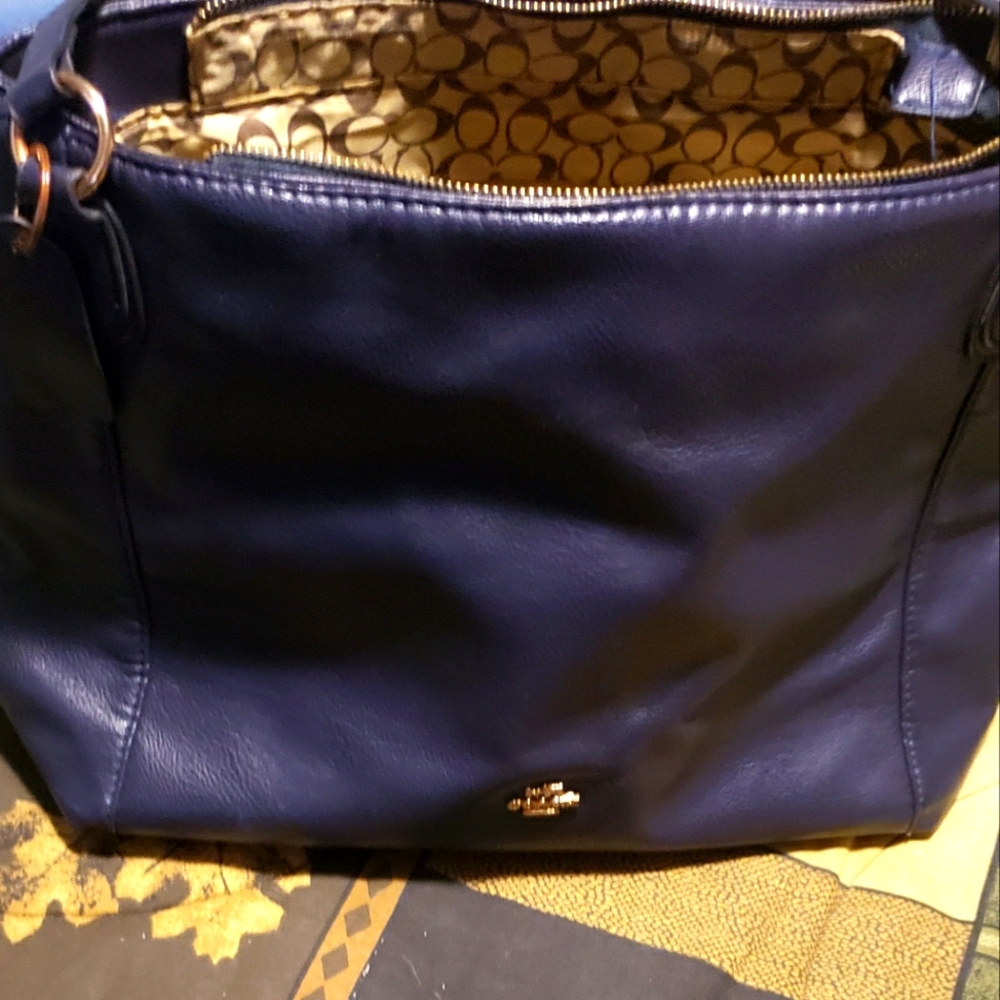 My navy coach shoulder bag carried 2 months and switched